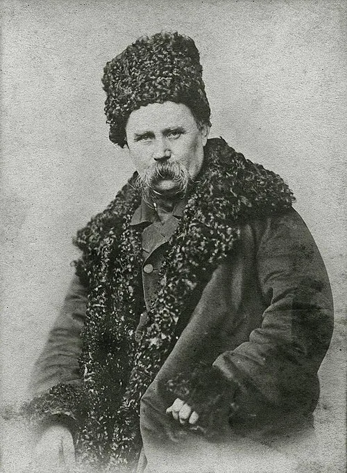 Тарас Шевченко в меховой шапке и тулупе